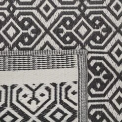 Beliani Outdoortapijt - BARMER Zwart Polypropyleen 120x180 Cm -Tapijt Wereld 83d6006bfc0b4d32bcd951bf41499d74